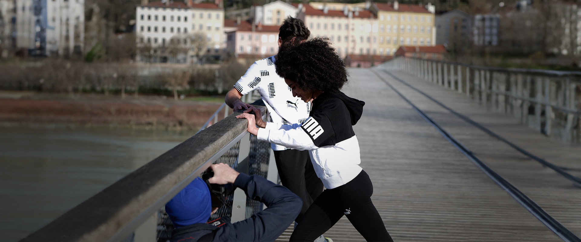 Prise de vue shooting Puma Lyon pont mannequins couple homme femme survêtements running